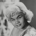 A young African American woman with short, blonde hair
