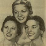 Three young white women in a posed studio shot
